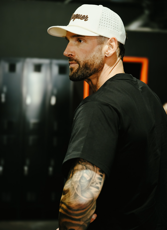 Conquer Performance Golf Hat in green — front view